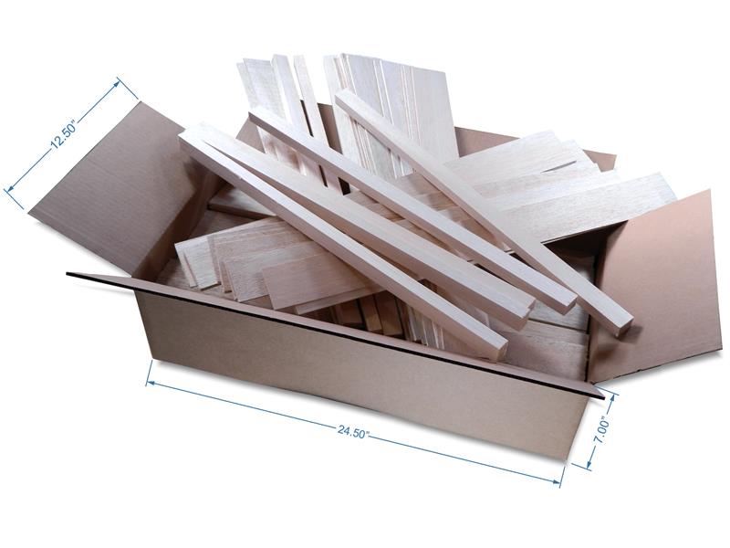 Box of various size balsa pieces, sticks and sheets